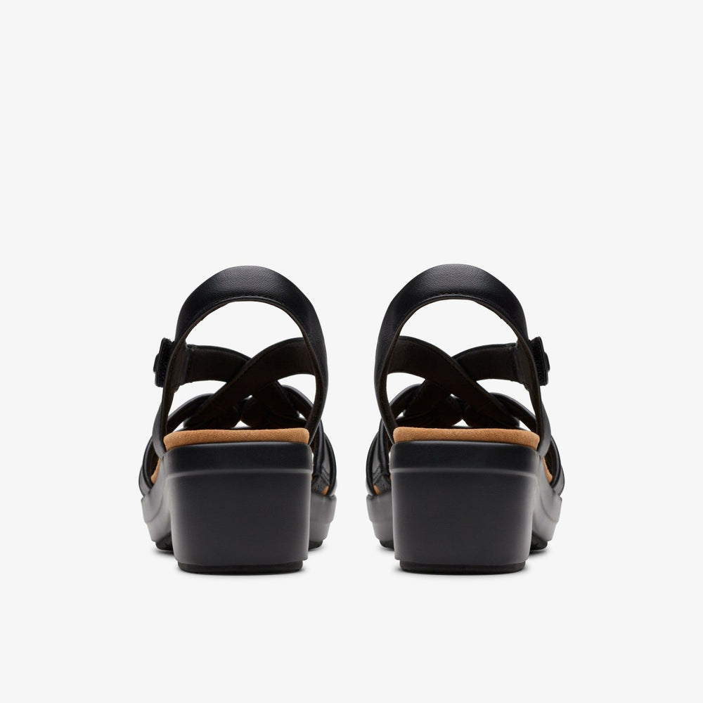 Tuleah Cross Black Leather